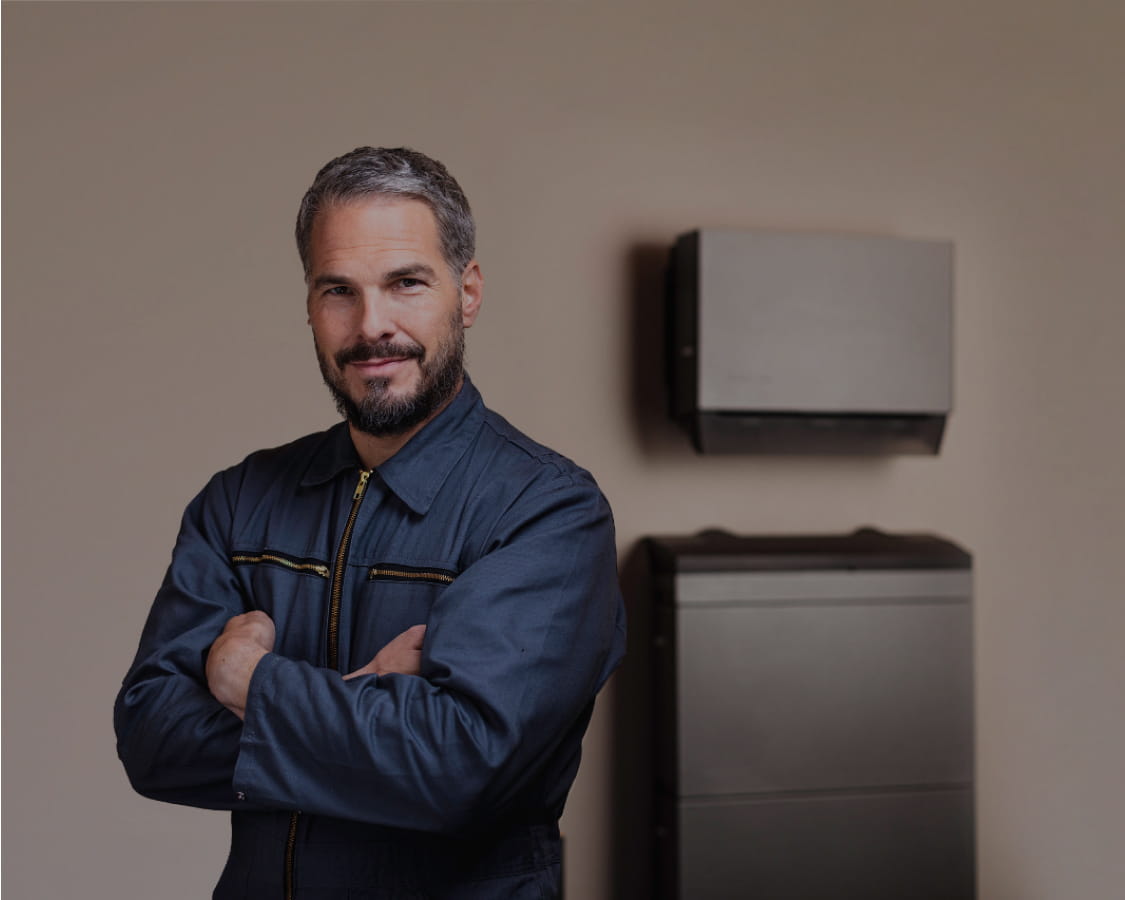 Versatile man standing confidently in front of EcoFlow power solutions, showcasing reliable portable energy devices for sustainable power supply and renewable energy solutions in Ireland.