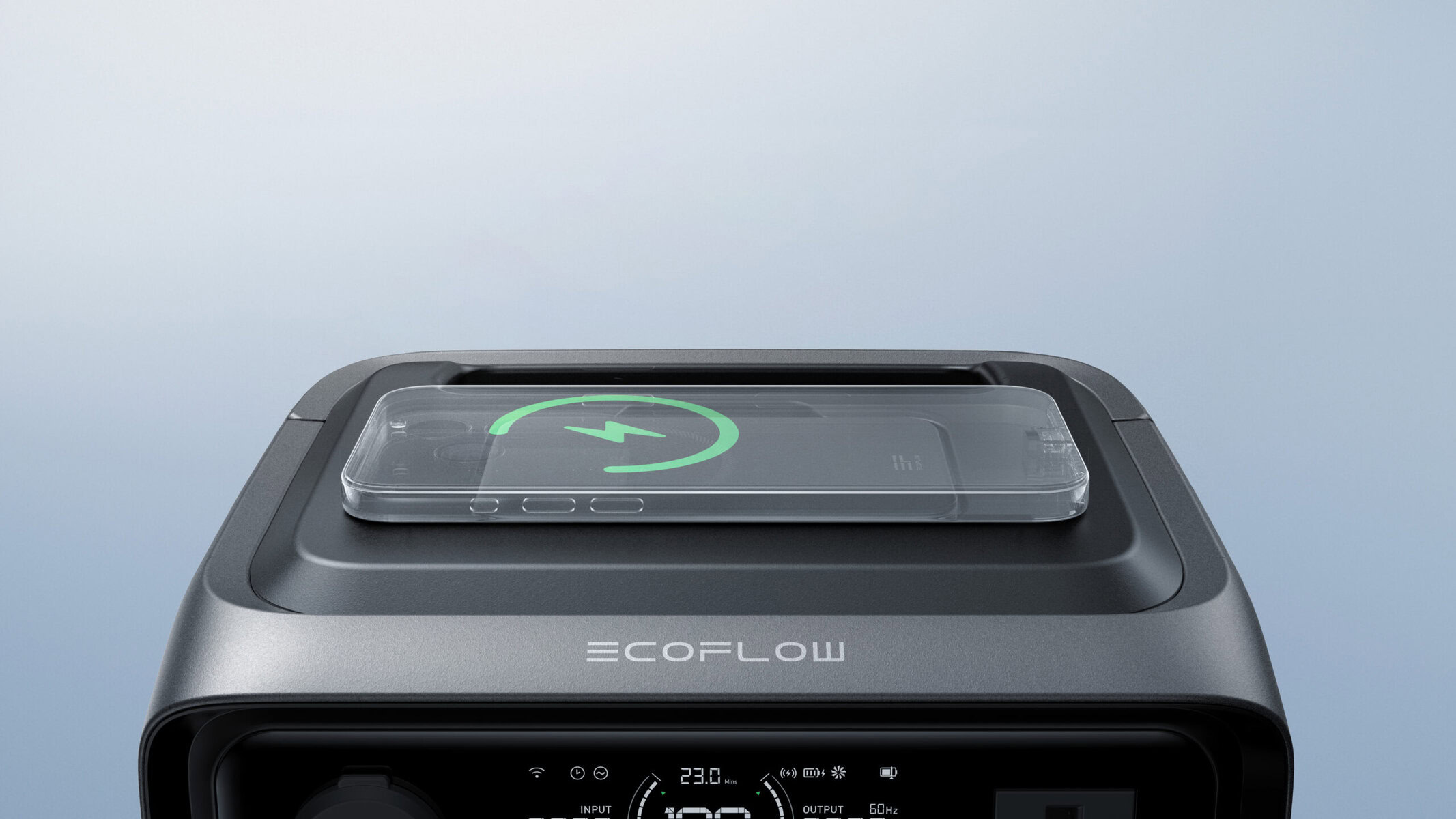 Rechargeable power station with wireless charging pad on top, EcoFlow branding, digital display, and control buttons for portable energy solutions.